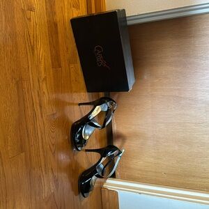 Carlos Santana patent leather t-strap heels